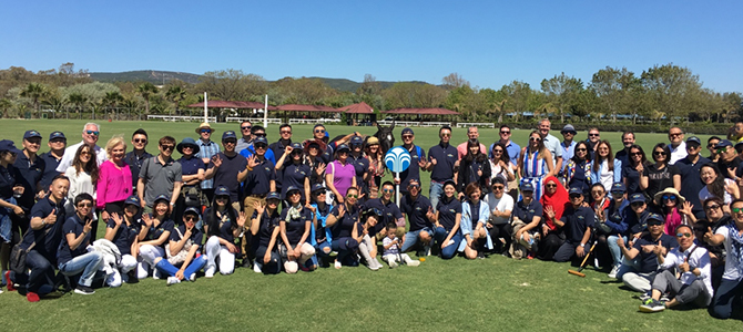 Nu Skin sales leaders and Nu Skin management pose for a picture at the Santa Maria Polo Club.